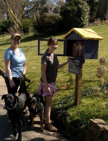 The Wurtzel family stopped by the Tucker Little Free Library this weekend!.jpg